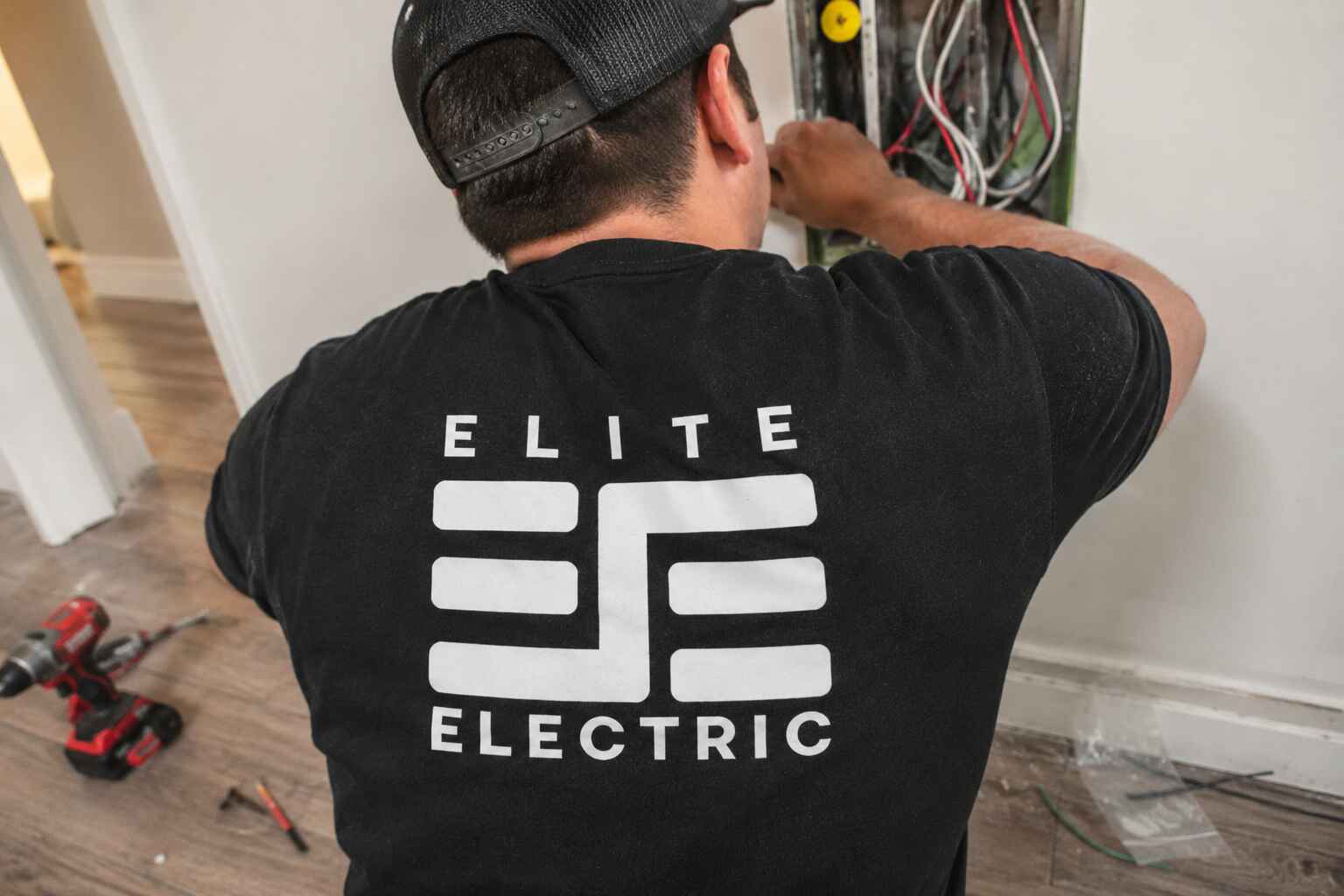 Tyler Gordon DOPL licensed master electrician Elite Electric at work Holladay area Utah