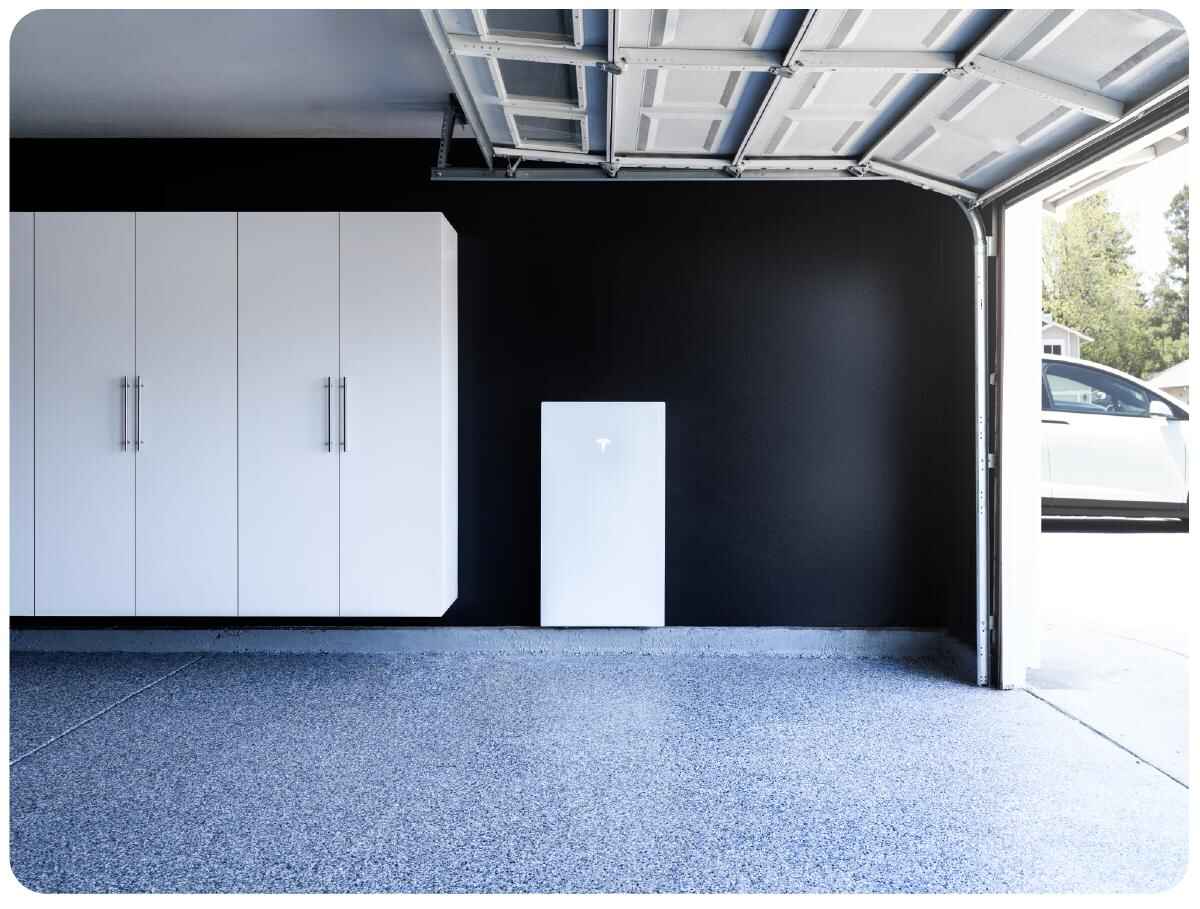 Tesla Powerwall installed in garage — Elite Electric Utah certified installer — Bountiful, UT